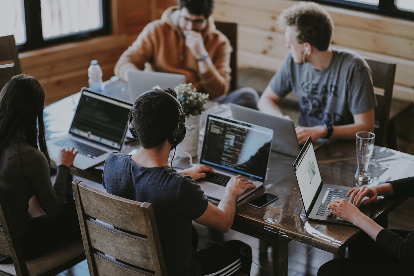 Engineers working together around a table